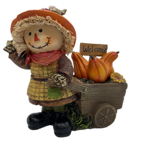 Load image into Gallery viewer, 6&quot; Resin Scarecrow with Pumpkin Cart 2 Assorted
